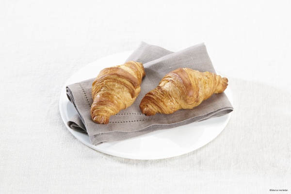 Schmackhaftes mini Buttercroissant mit knusprigem Teig. Ideal für die Gastronomie!